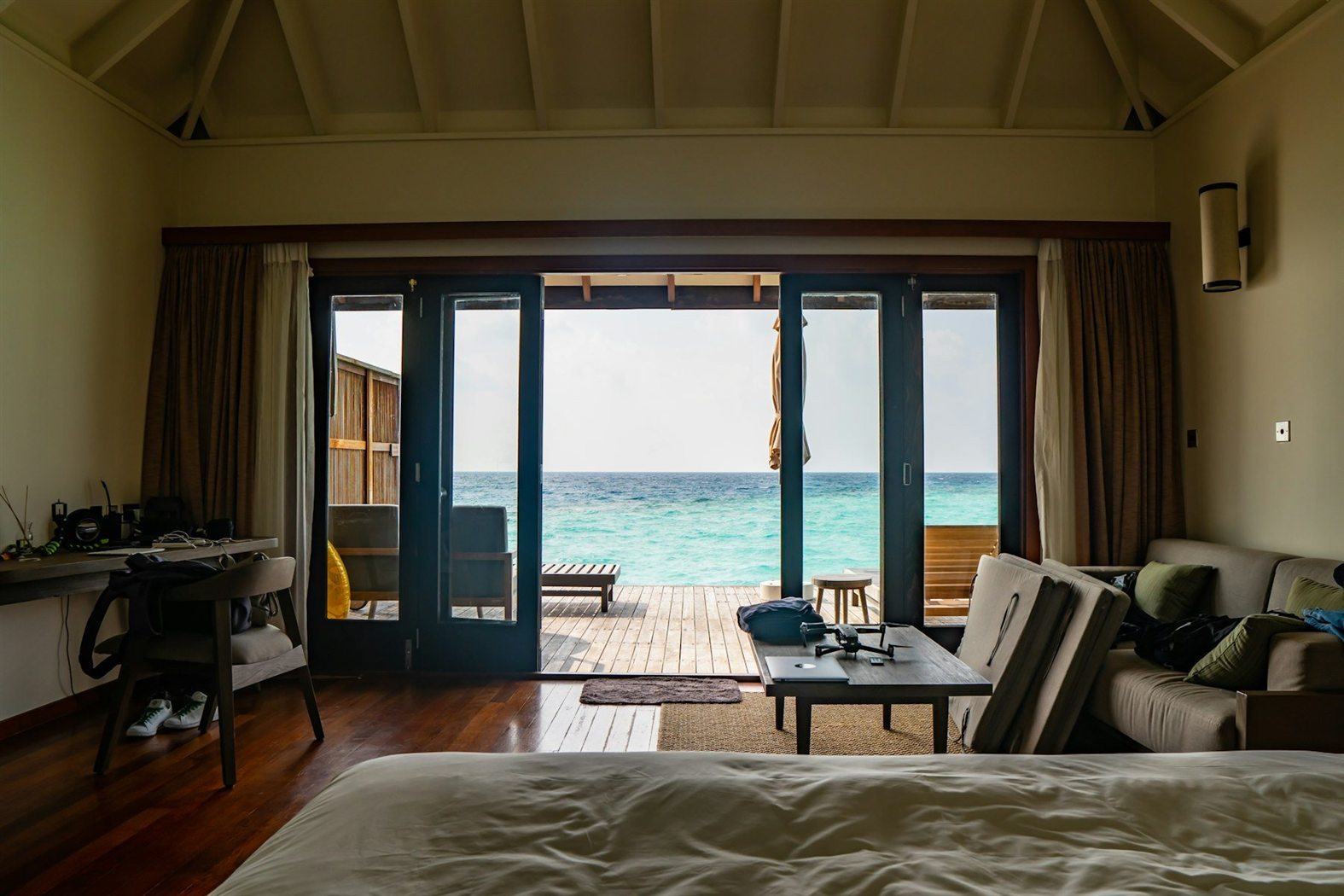 A sea-facing suite opening to the water.